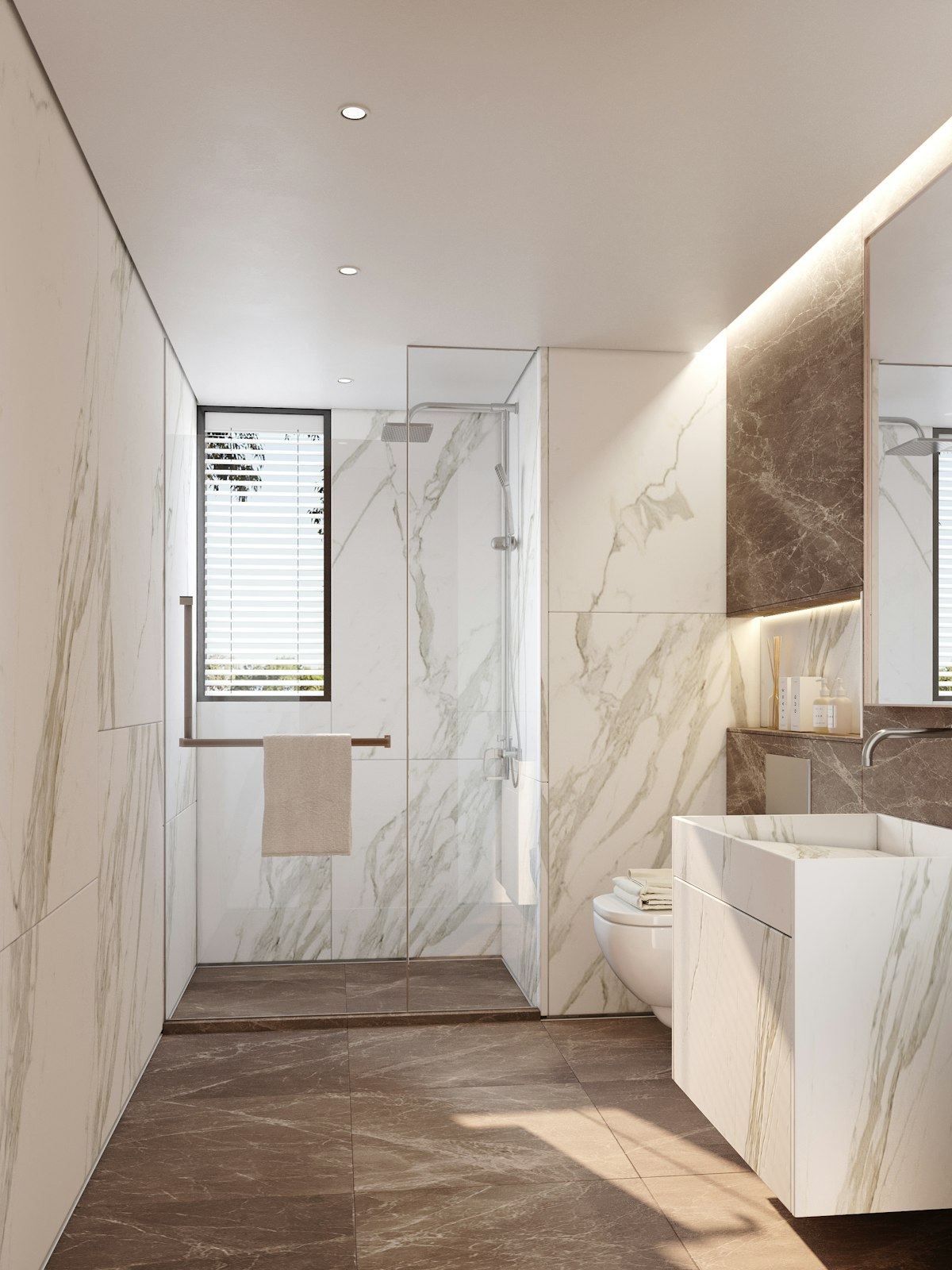 Renovated bathroom with stone finishes and a freestanding bath